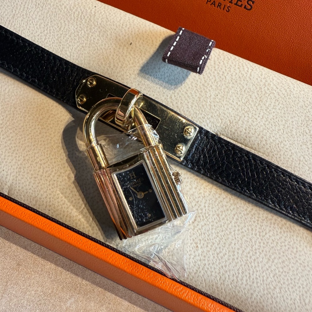 Hermès Black Leather Watch with Gold Lock
